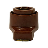 Top-down view into the distributor shaft bore showing the internal D-shaped keyed opening and the small spring clip retainer seated inside the hub.