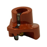 Frontal view of rotor hub and arm; spring metal clip fully visible running vertically across the shaft bore slot; small round brass locating post at base of arm.