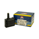 Part and open box together, part positioned to the left of box. Confirms part matches box label; secondary barcode label visible on right side of box.