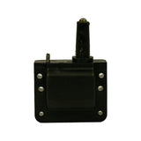 Front face of coil, straight-on. Flanged mounting plate with four corner holes, raised central body housing. Single low-tension spade terminal visible on left edge. Minor dust/shelf wear on rubber tower.