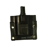 Front-face view of coil body, clearly showing CT11 M117 stamping on upper housing and 9210310201 CT-11 on lower metal base flange. Four mounting holes with brass inserts visible. Single HT tower at top with small clip-tab alongside.