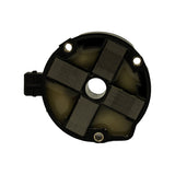 Top-down view of the upper face: ferrite-core cross arms, central spark plug bore, and three brass mounting eyelets around the perimeter