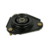 Oblique view of strut mount underside showing central rubber-isolated bearing recess, flat mounting flange, and three gold-zinc plated threaded studs extending downward from corners.