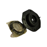 Side-on view of the strut mount and the sealed plastic bag containing the matching ball bearing and lower spring seat / isolator components.