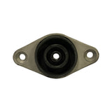 Top-down view through the flange showing the bonded rubber bushing, central metal sleeve and the two oval flange bolt holes