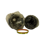 Kit partially unpacked — inner joint tulip housing (left, cup-shaped with internal splines visible through bag), outer joint body (right, still bagged), and gold/rainbow zinc retaining ring laid separately in foreground
