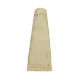 White plastic grease tube, tapered conical body with rounded cap, unlabelled, showing surface grime and age marks consistent with long storage.