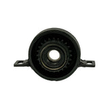 Rear face of the assembly revealing a toothed/serrated inner rubber ring surrounding the bearing bore, providing a dust and vibration damping feature distinct from the smooth front face.