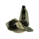 Two kit components removed from box and still in original factory clear poly bags: left bag contains the rubber CV boot/gaiter with retaining snap ring; right bag contains the outer CV joint body (splined conical shaft with ball joint race housing). Label on left bag reads '00 5075 00'.