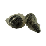 Alternate angle of both bagged components together — boot gaiter bag (left, rounded profile) and CV joint body bag (right, conical shaft profile). All components still sealed in original factory packaging.