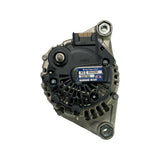 Rear view of the alternator. Black plastic rear end cap with 'Valeo' moulded into the housing. OEX blue 'Brand New Unit' label reads 'MX / MXA358 / 255788 / Supplied by OEX / Made in Korea / D546'. Three screws and two terminal studs visible. Unit has internal fan visible through rear grille openings.