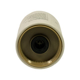 Top-down view showing tan/gold plastic threaded mounting collar with central black rubber seal grommet and vent holes; outer white canister wall visible around collar perimeter.