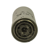 Top (closed end) of filter body. Stamped metal dome visible with minor scuffs and light surface soiling consistent with shelf storage. No rust or structural damage.