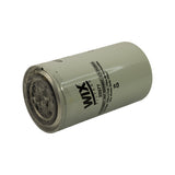 Bottom (threaded inlet) end of filter, angled view. Threaded port visible with residual grease/lubricant on gasket area — consistent with NOS storage. Light surface soiling around seam.
